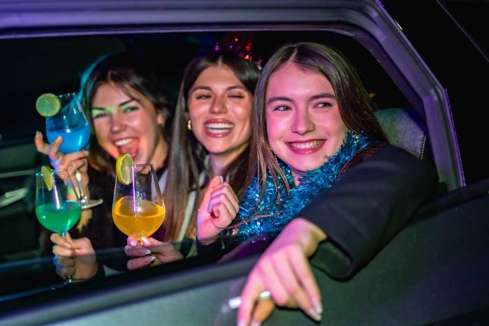 A group heading out for the evening in a DG car